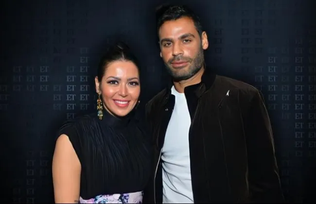 لقاء الخميسي تكشف حقيقة ما نُسب إليها بشأن أزمة زوجها